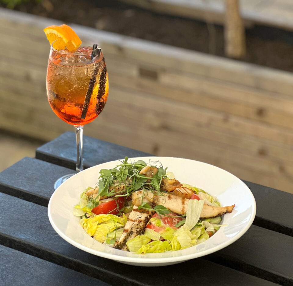Caesar salad and aperol aztec bistro
